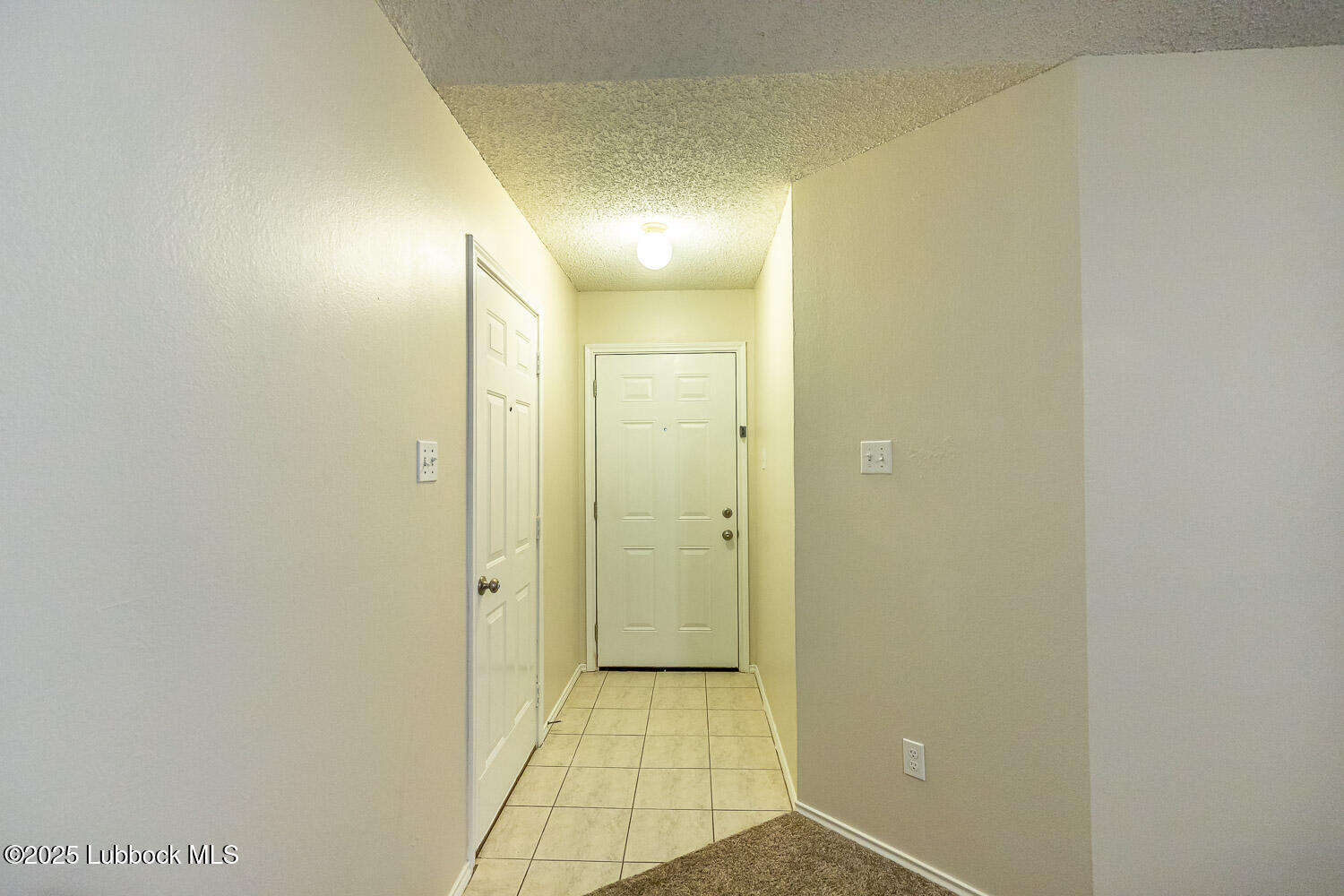 6120 7th Drive Lubbock, TX 79416 - Photo 3 of 33 a view of a hallway