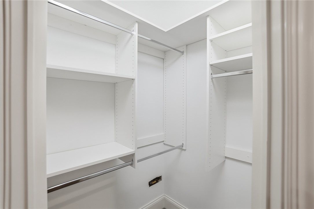 159 Rue Marseille Kettering, OH 45429 - Photo 38 of 52 This organized walk-in closet offers extensive shelving and hanging space for effortless storage.