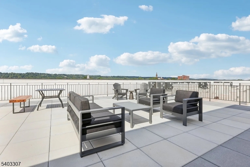 49 South Day Street, Unit 316 Orange, NJ 07050 - Photo 22 of 26 a view of a terrace with lawn chairs