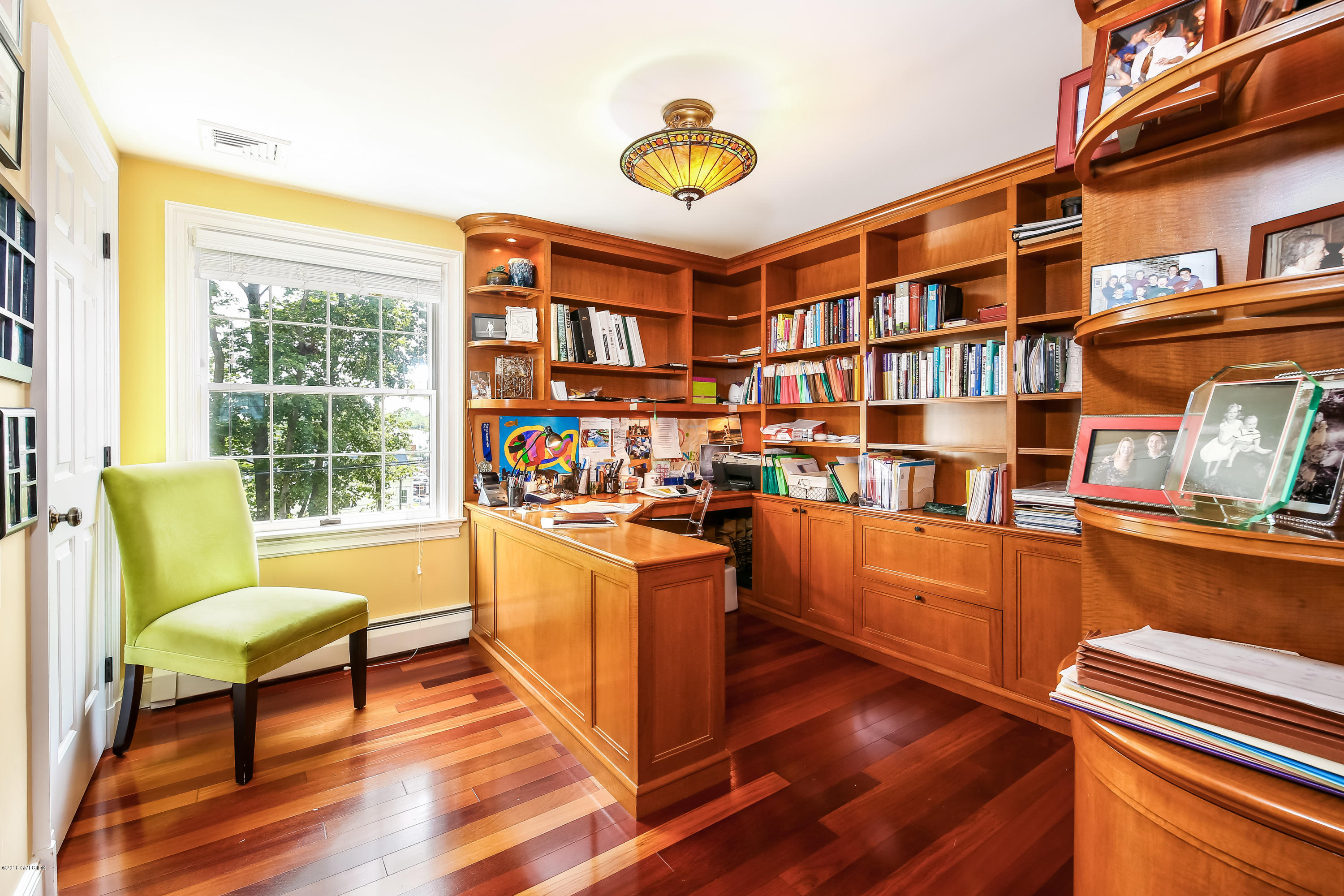52 Ute Place, Unit A Greenwich, CT 06830 - Photo 22 of 32 a living room with furniture and a window