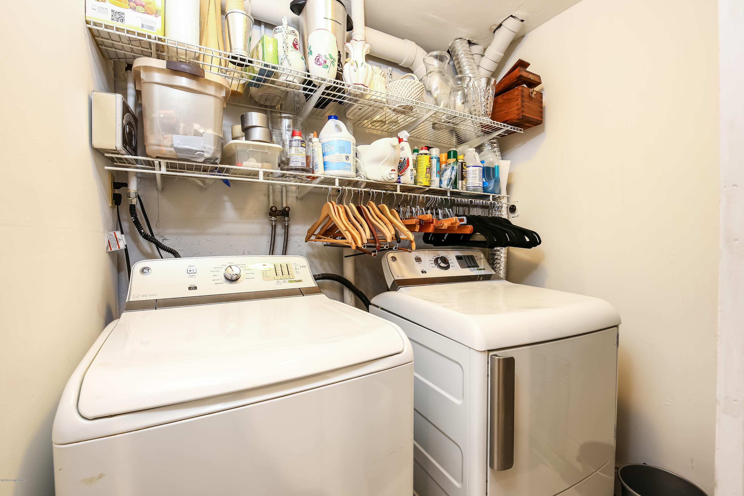 52 Ute Place, Unit A Greenwich, CT 06830 - Photo 26 of 32 a utility room with dryer and washer