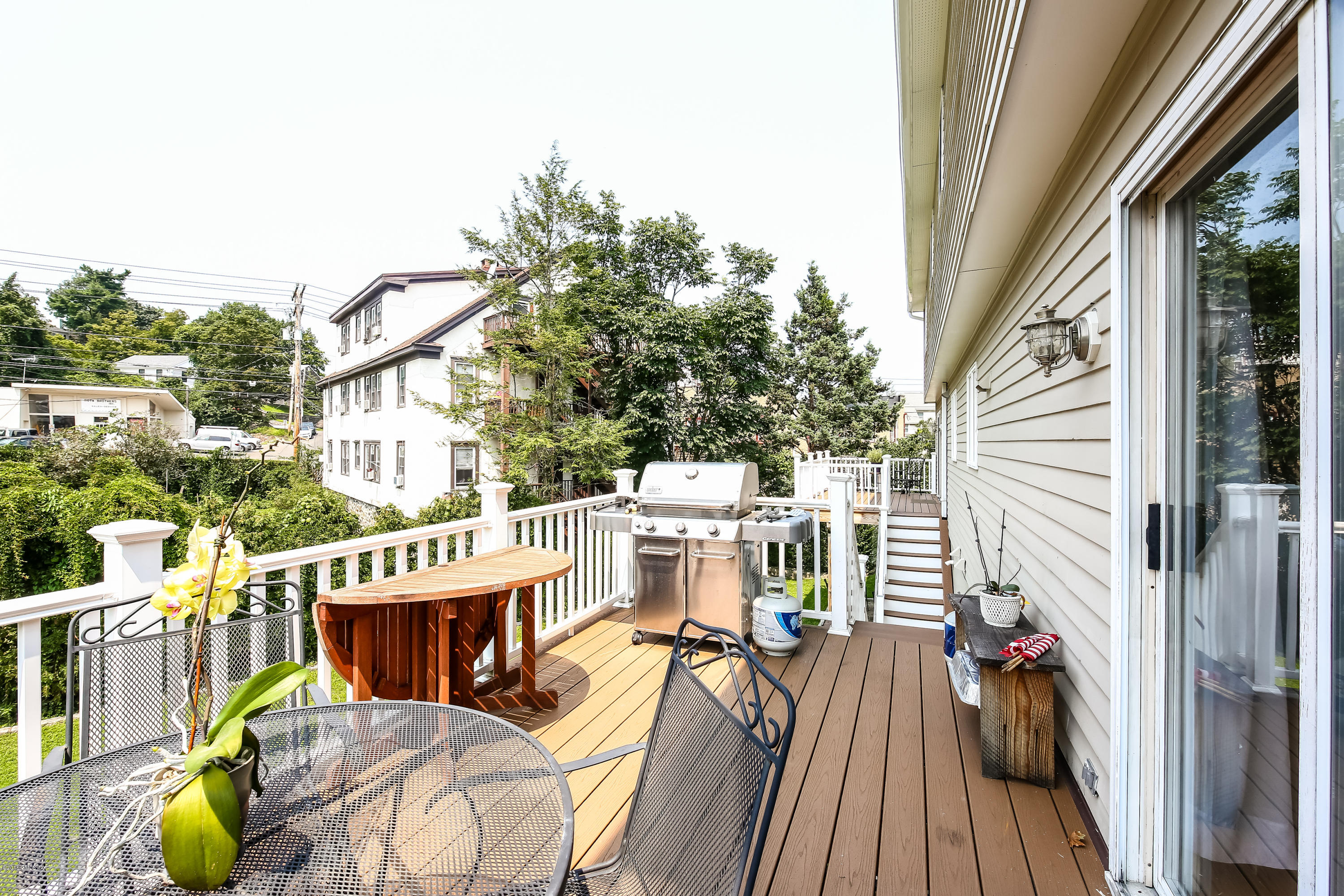52 Ute Place, Unit A Greenwich, CT 06830 - Photo 27 of 32 a view of a balcony with furniture