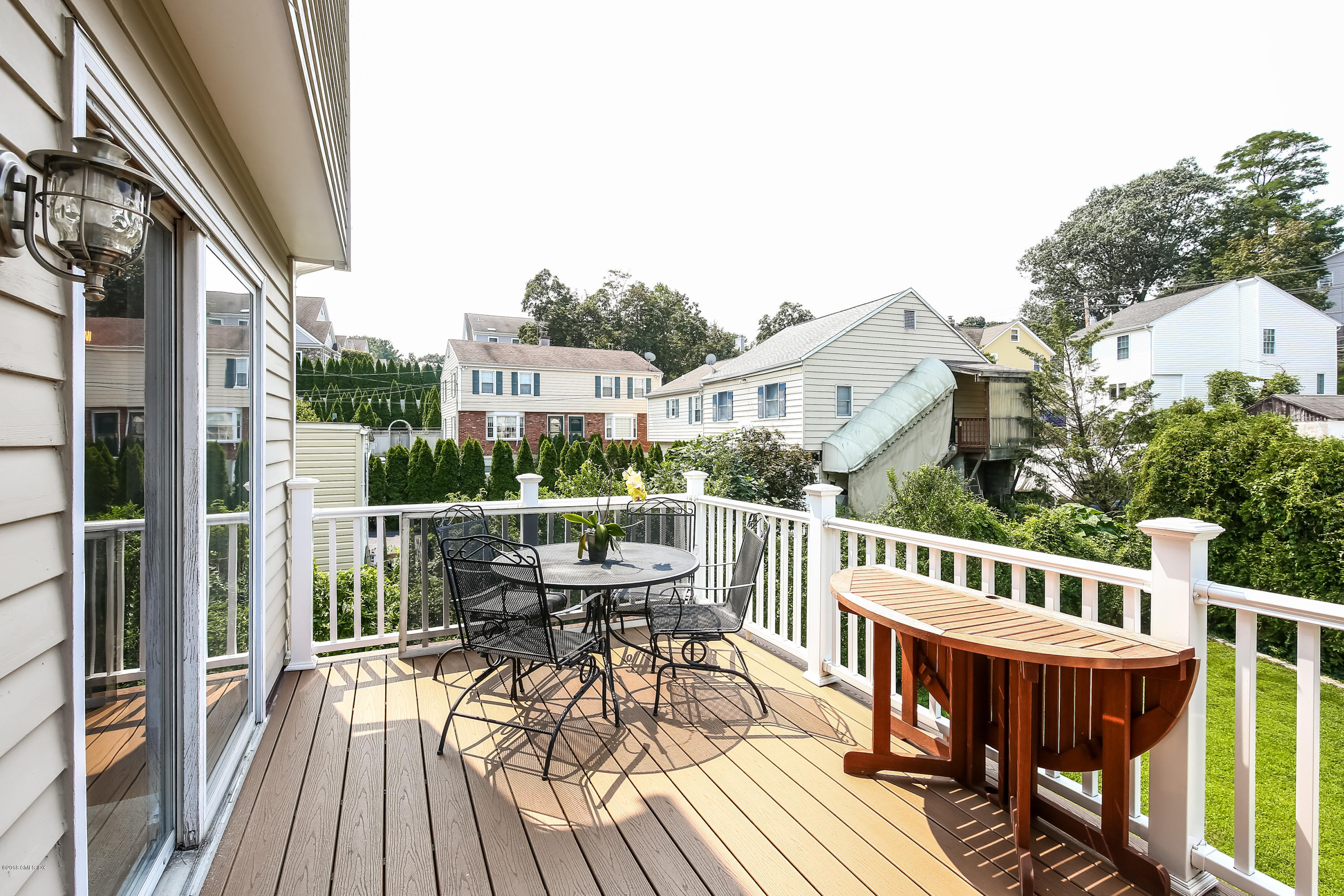 52 Ute Place, Unit A Greenwich, CT 06830 - Photo 28 of 32 a view of a roof deck with table and chairs