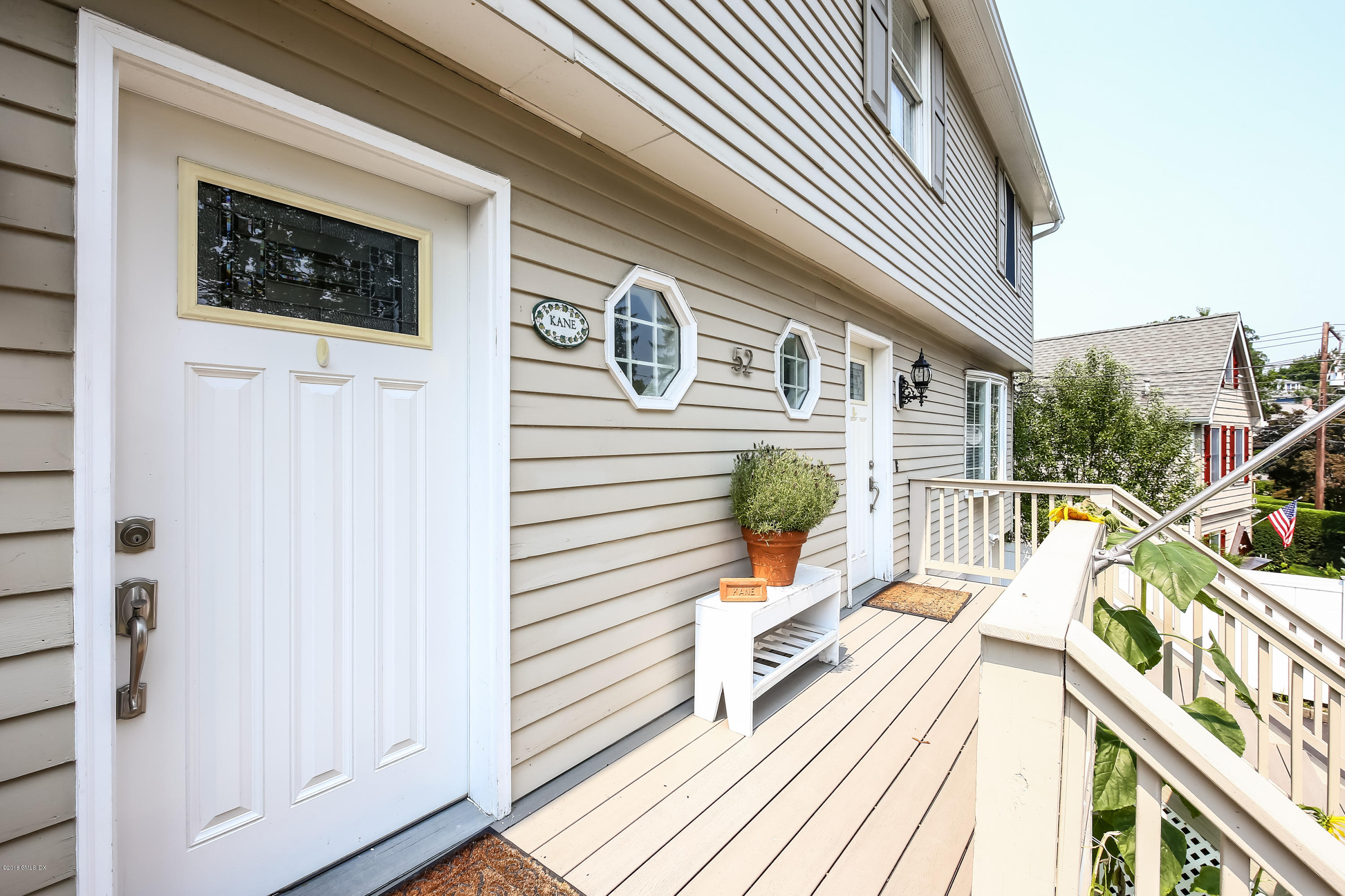 52 Ute Place, Unit A Greenwich, CT 06830 - Photo 4 of 32 a view of a house with backyard and deck