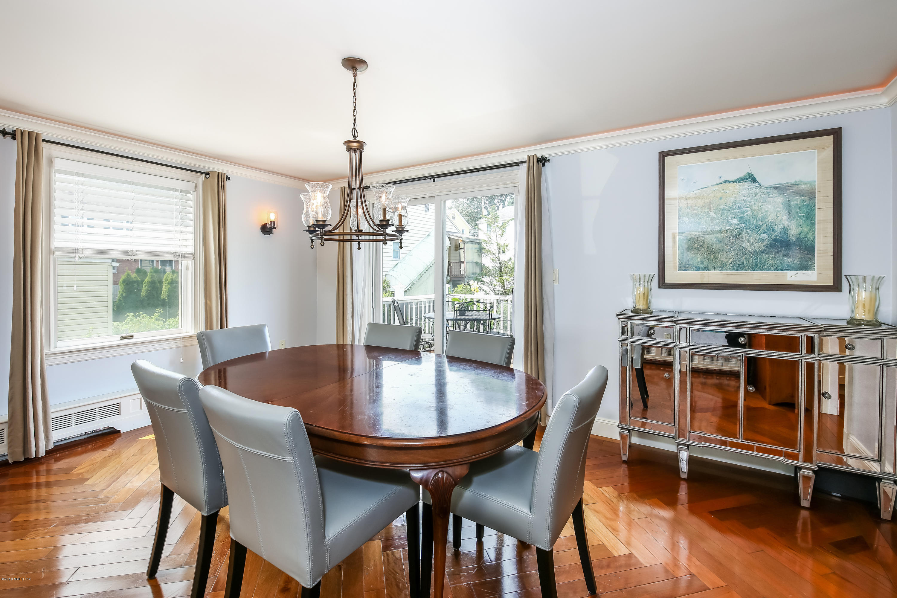 52 Ute Place, Unit A Greenwich, CT 06830 - Photo 10 of 32 a dining room with furniture and window