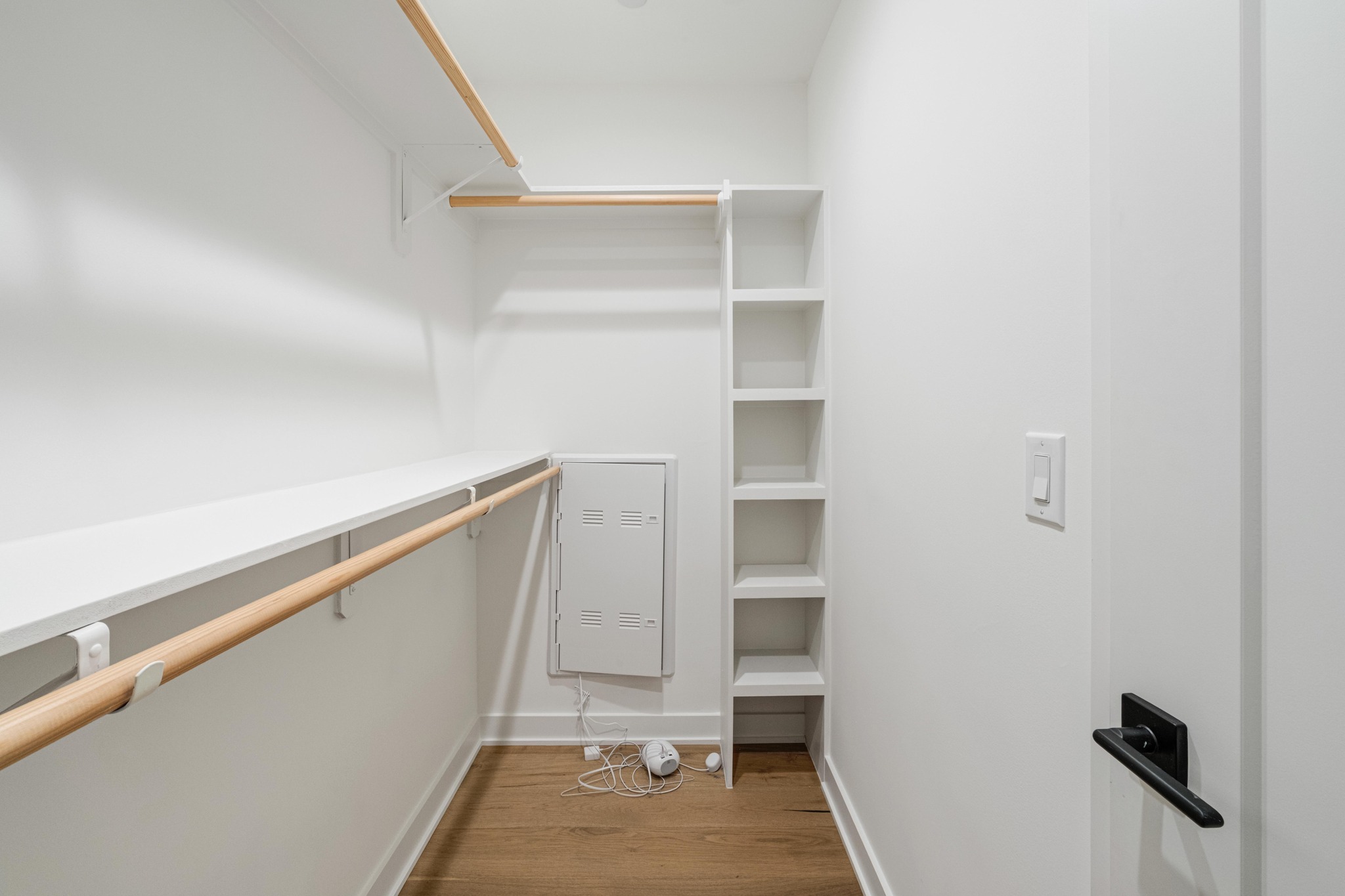 84 East Avenue, Unit 2008 Austin, TX 78701 - Photo 20 of 23 Ample shelving and hanging space offer organized storage in this functional walk-in closet.