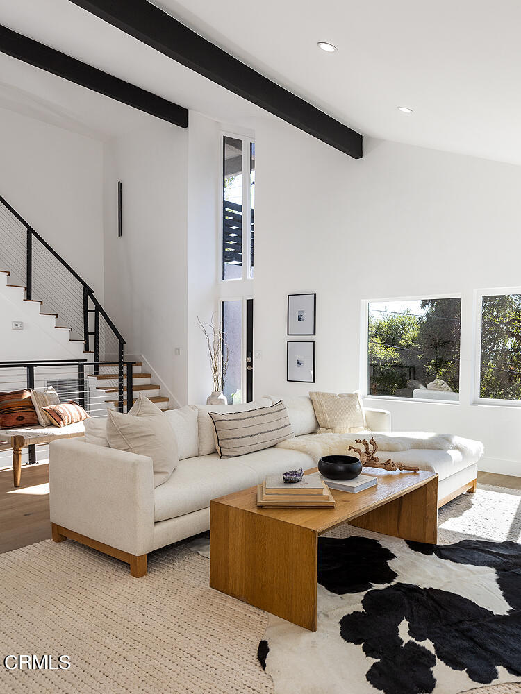 1203 Romney Drive Pasadena, CA 91105 - Photo 12 of 40 a living room with furniture and a flat screen tv