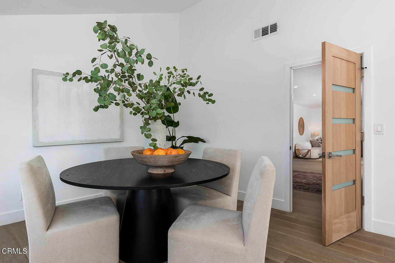 1203 Romney Drive Pasadena, CA 91105 - Photo 16 of 40 a dining room with furniture and wooden floor