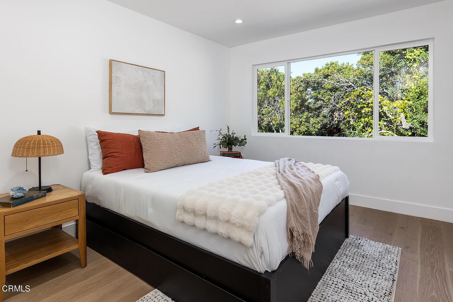 1203 Romney Drive Pasadena, CA 91105 - Photo 28 of 40 a bedroom with a bed and a lamp next to a window