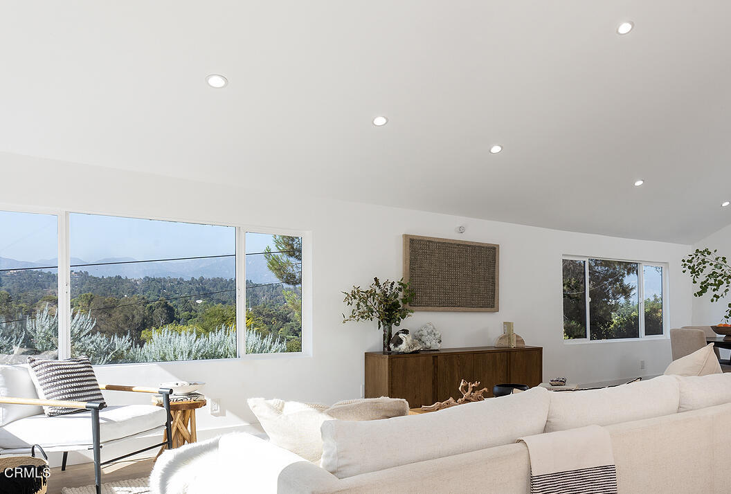 1203 Romney Drive Pasadena, CA 91105 - Photo 8 of 40 a living room with furniture and a flat screen tv