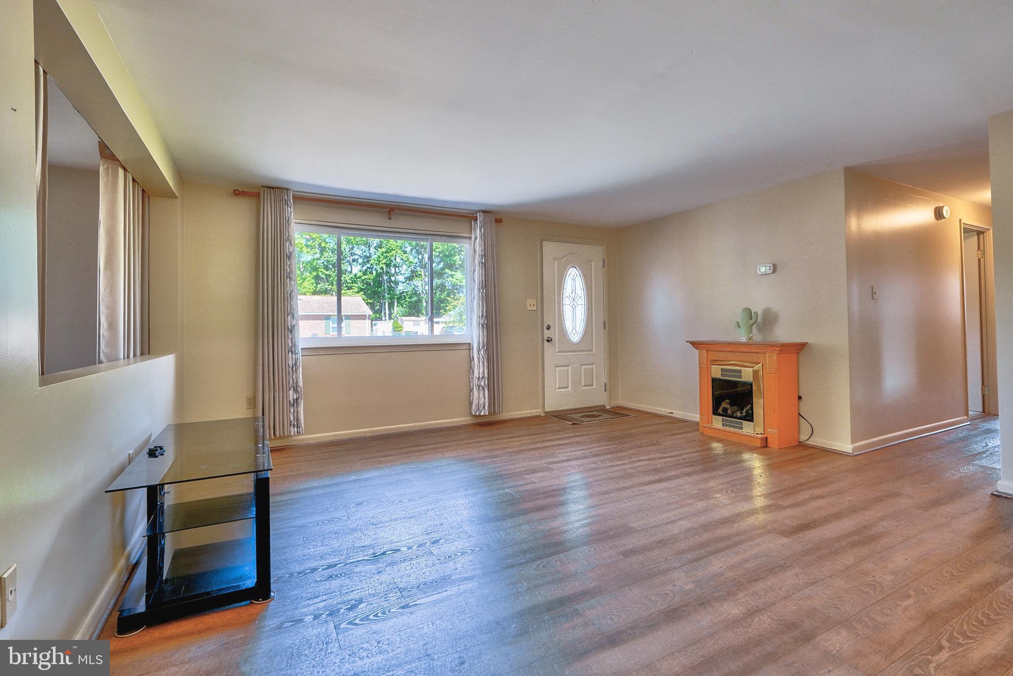 2505 Eugene Avenue Sparrows Point, MD 21219 - Photo 9 of 54 LIVING RM w/ELEC FIREPLACE & BAY WINDOW!
