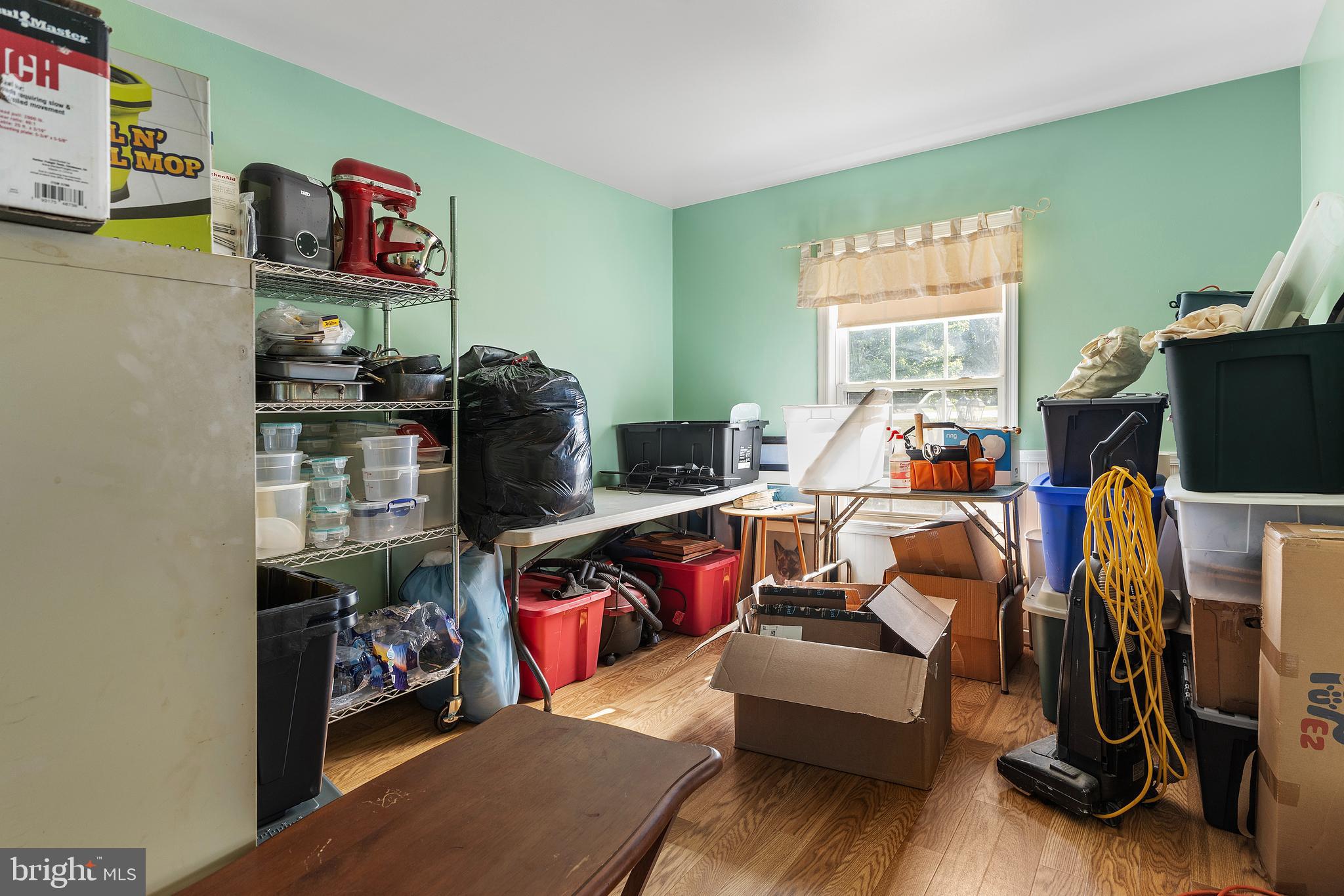 7112 East New Market Ellwood Road Hurlock, MD 21643 - Photo 16 of 41 a room with storage and utility