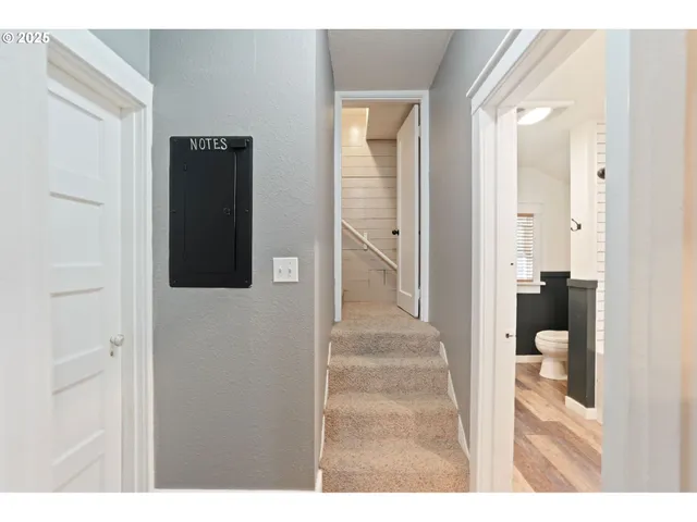 a utility room with closet and window
