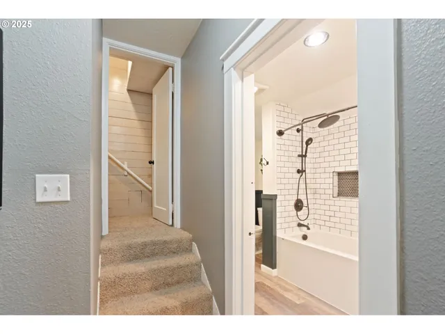 a bathroom with a sink a mirror and a window