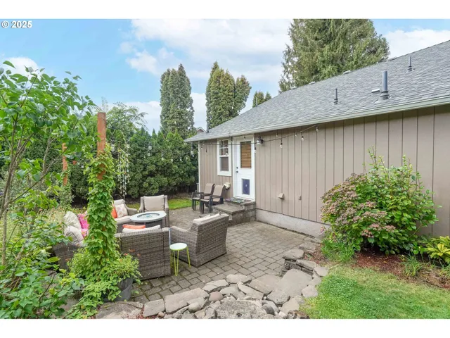 a backyard of a house with lots of green space