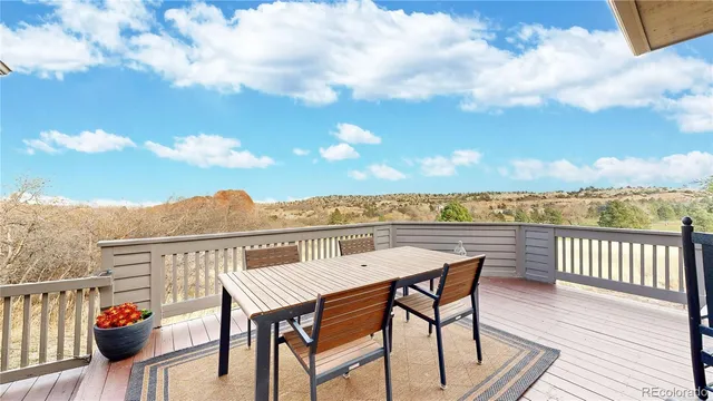 a view of a terrace with furniture