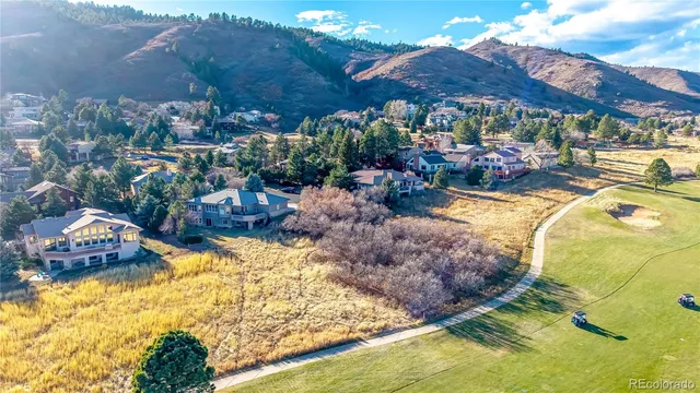 a view of a swimming pool and lounge chair