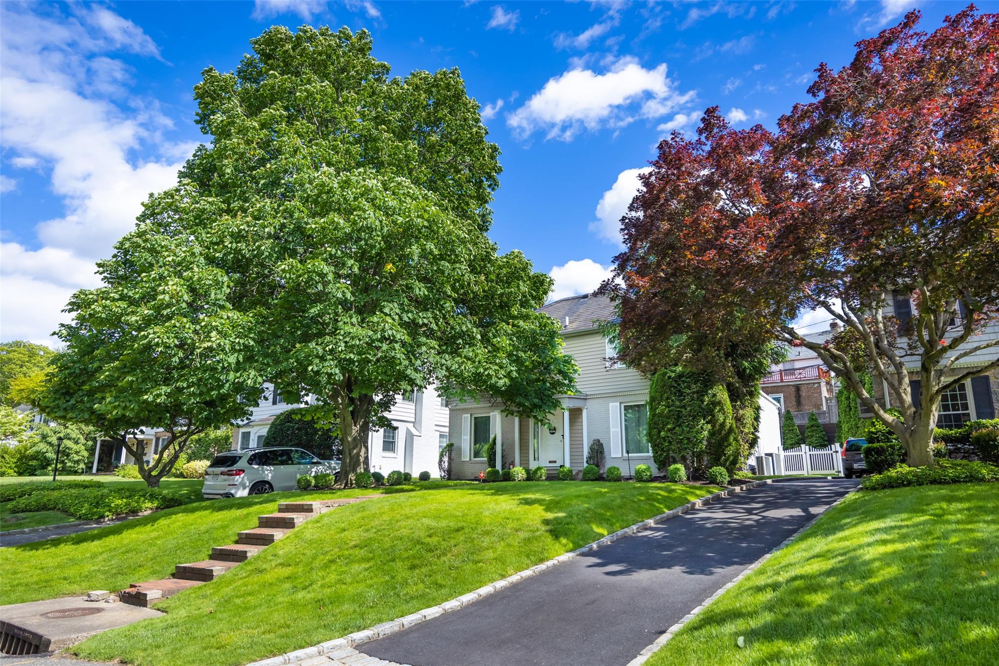 84 Bates Road Great Neck, NY 11020 - Photo 1 of 1 Front view of the house