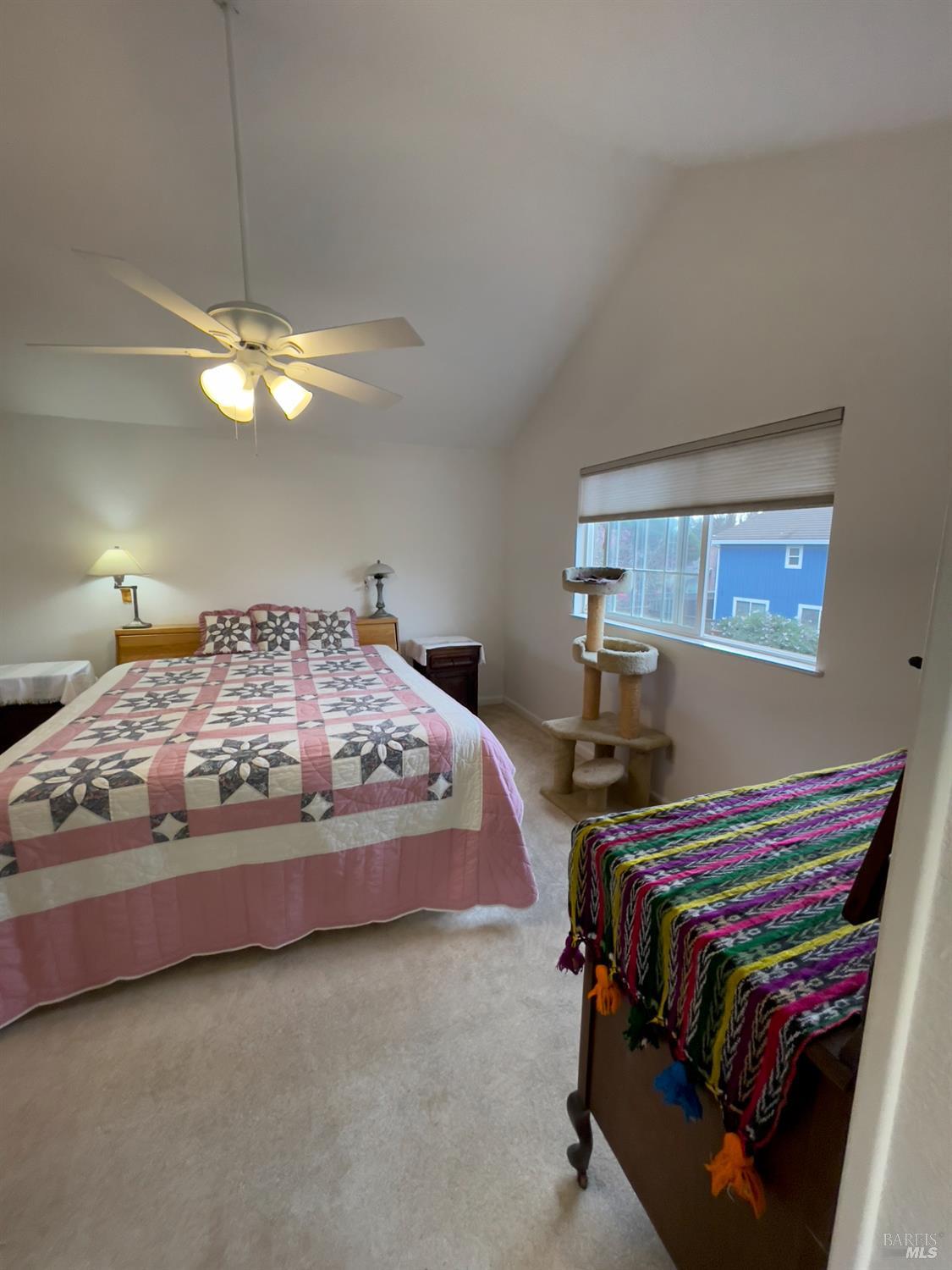 6191 San Carlos Court Rohnert Park, CA 94928 - Photo 30 of 37 a bedroom with a bed and a chandelier