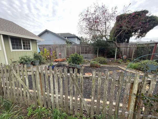 a house view with a garden space