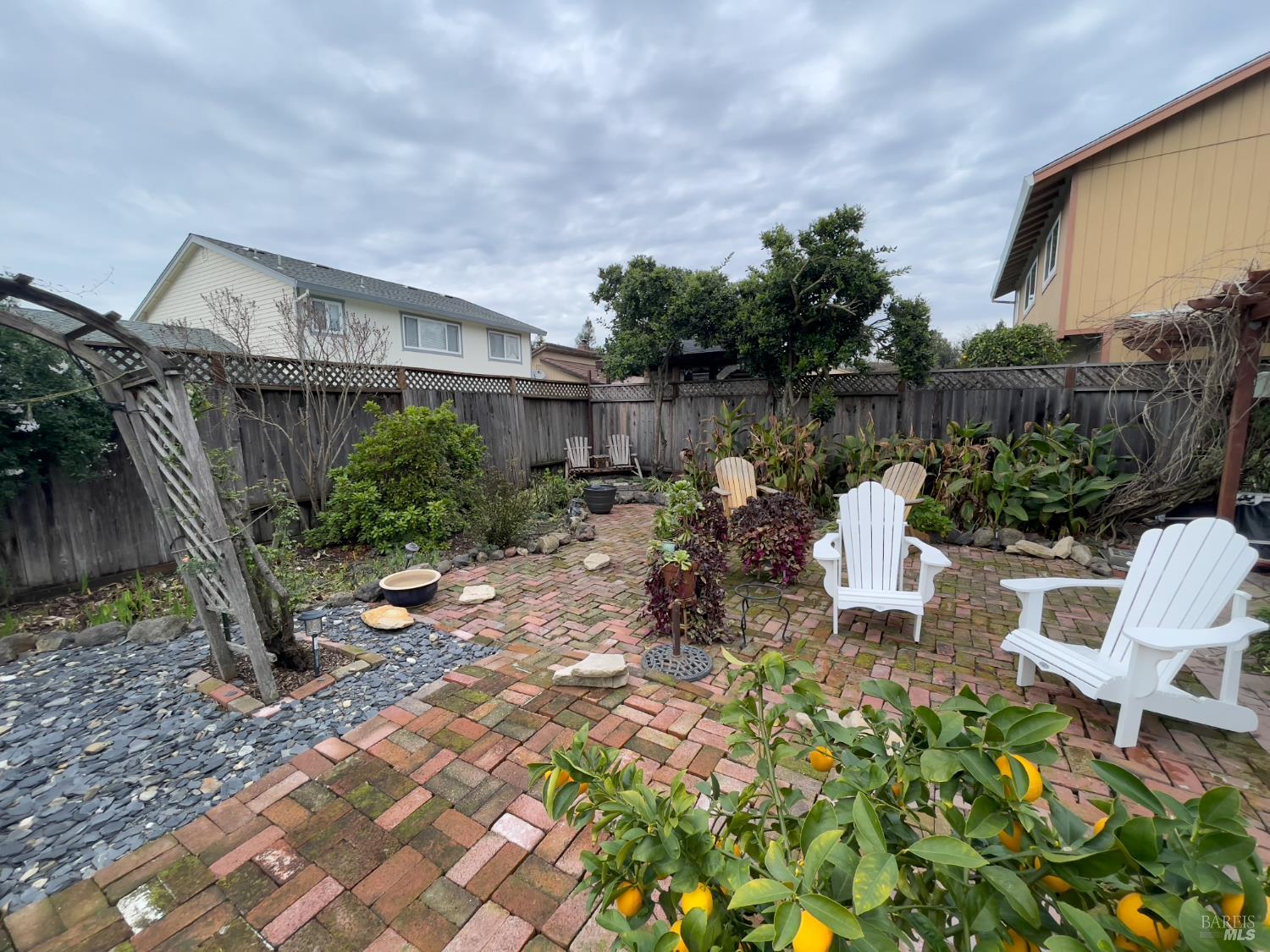 6191 San Carlos Court Rohnert Park, CA 94928 - Photo 36 of 37 a row of table and chairs in the patio