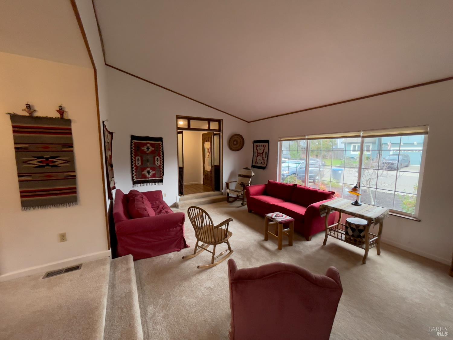 6191 San Carlos Court Rohnert Park, CA 94928 - Photo 5 of 37 a living room with furniture a flat screen tv and a window