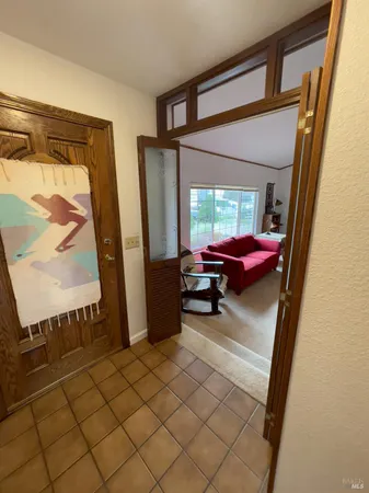 a bed room with a bed and a window