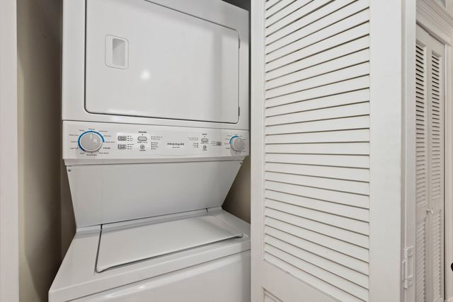 a view of a roof deck with wooden floor and furniture