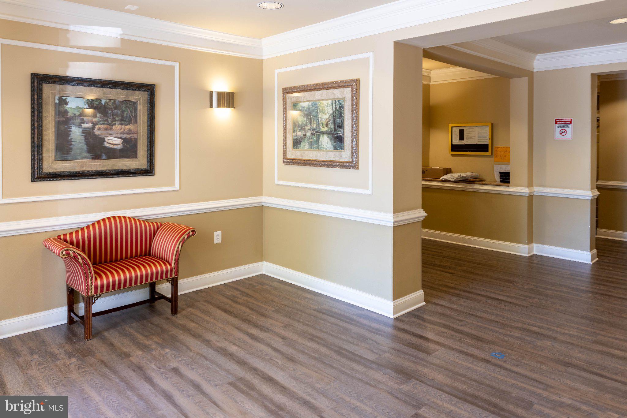 12824 Clarksburg Square Road, Unit 105 Clarksburg, MD 20871 - Photo 8 of 96 Inviting lobby with elegant decor.