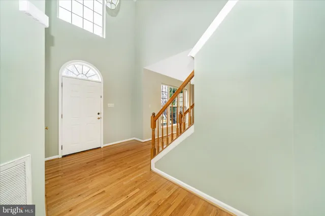 a view of a hallway with front door