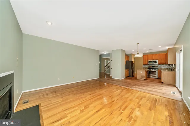 a view of a kitchen with a sink