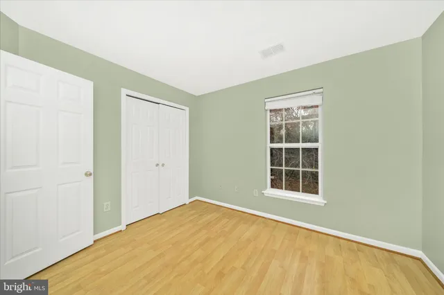 a view of empty room with windows