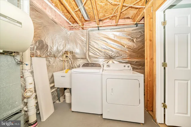 a view of an empty room and wooden floor