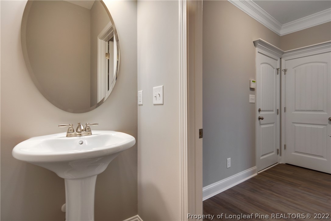 2643 Riddle Farm Hope Mills, NC 28348 - Photo 23 of 50 a bathroom with a sink and a mirror