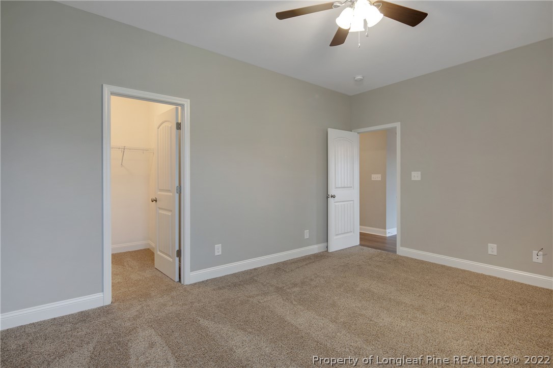 2643 Riddle Farm Hope Mills, NC 28348 - Photo 26 of 50 a view of an empty room with a chandelier fan