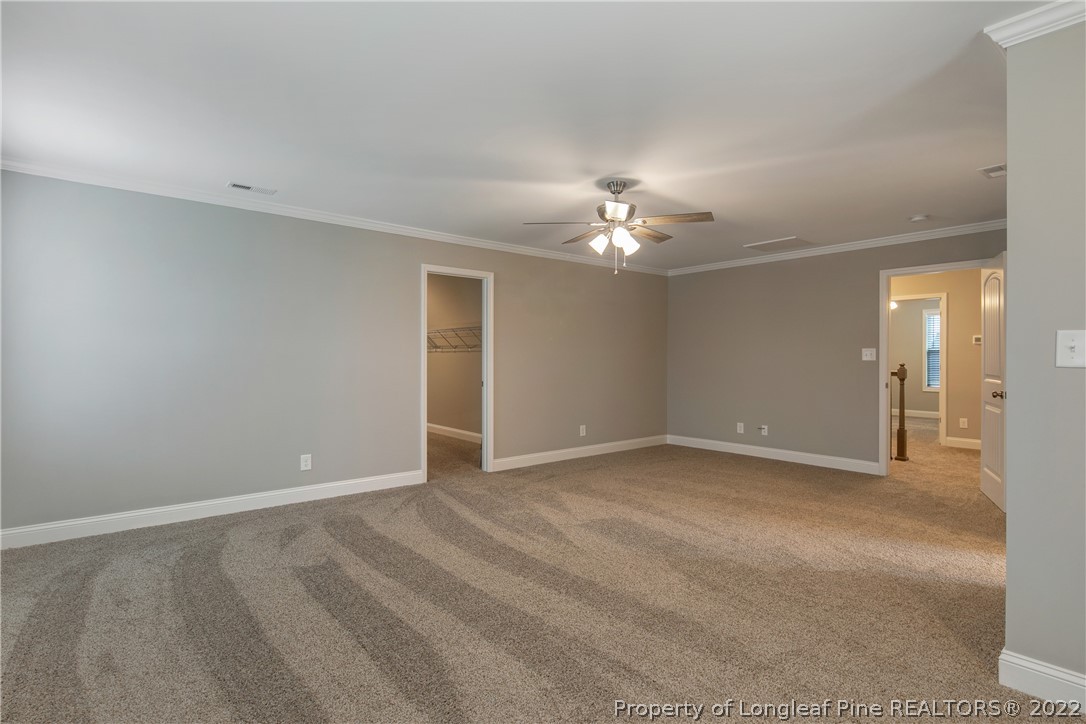 2643 Riddle Farm Hope Mills, NC 28348 - Photo 34 of 50 a view of an empty room with a chandelier fan