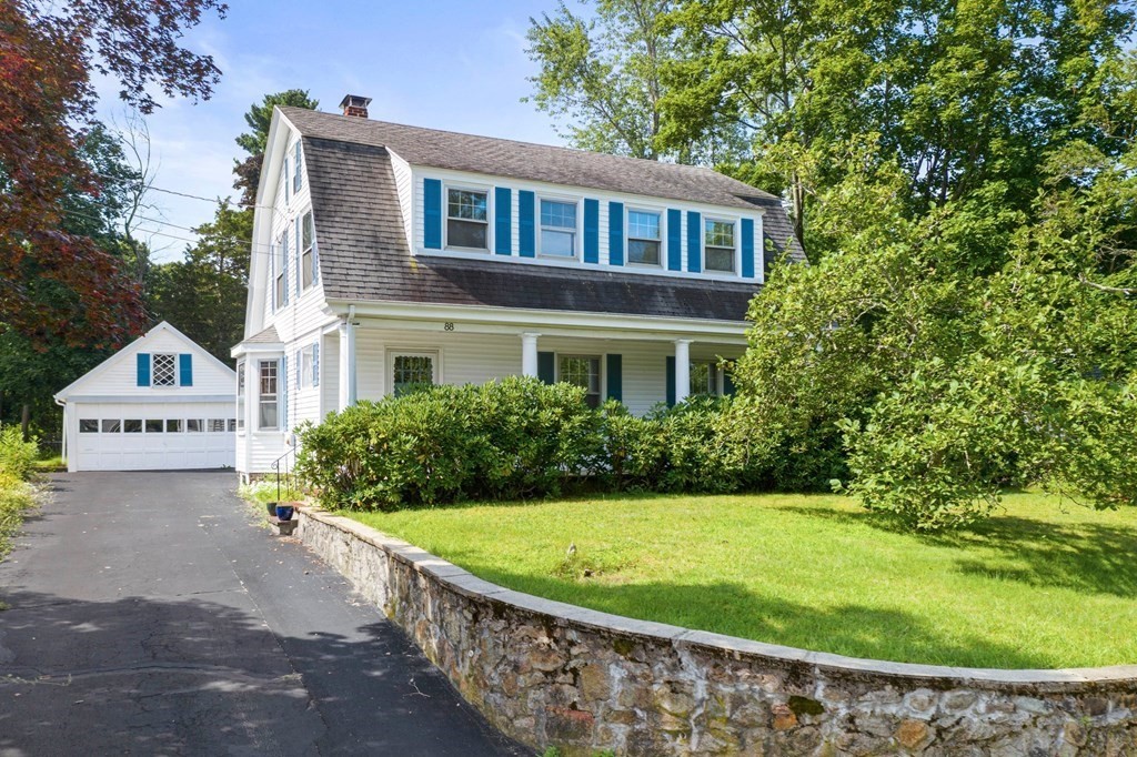 88 Independence Street Canton, MA 02021 - Photo 1 of 30 a view of a house with a yard and potted plants
