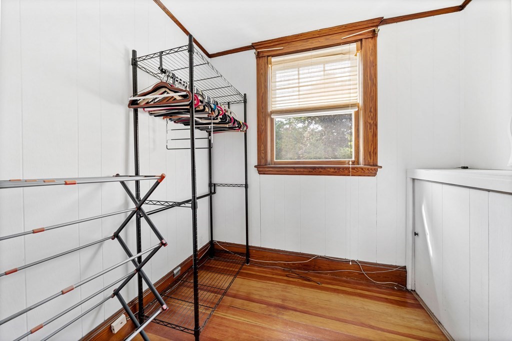 88 Independence Street Canton, MA 02021 - Photo 25 of 30 a view of a room with wooden floor and a window
