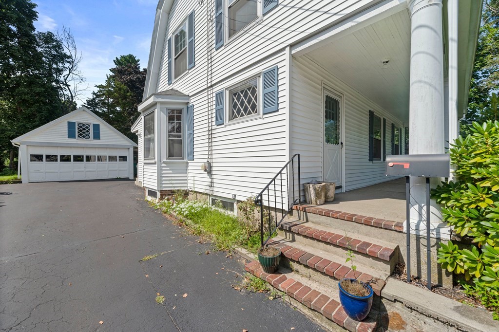 88 Independence Street Canton, MA 02021 - Photo 29 of 30 a front view of a house with garden