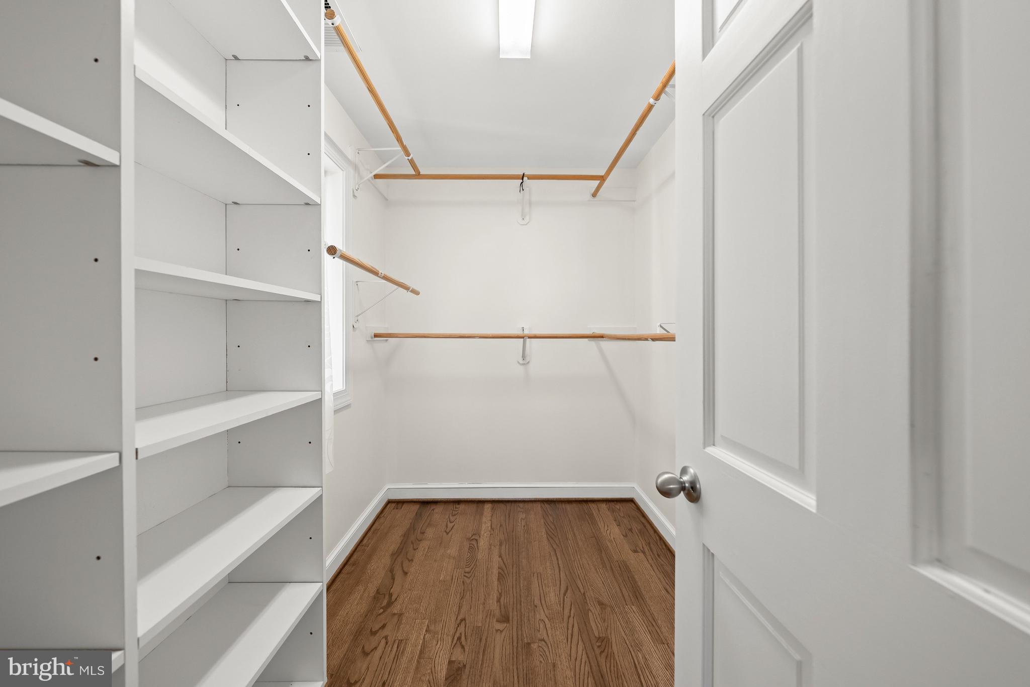 8800 Maywood Avenue Silver Spring, MD 20910 - Photo 25 of 41 a view of walk in closet with empty racks