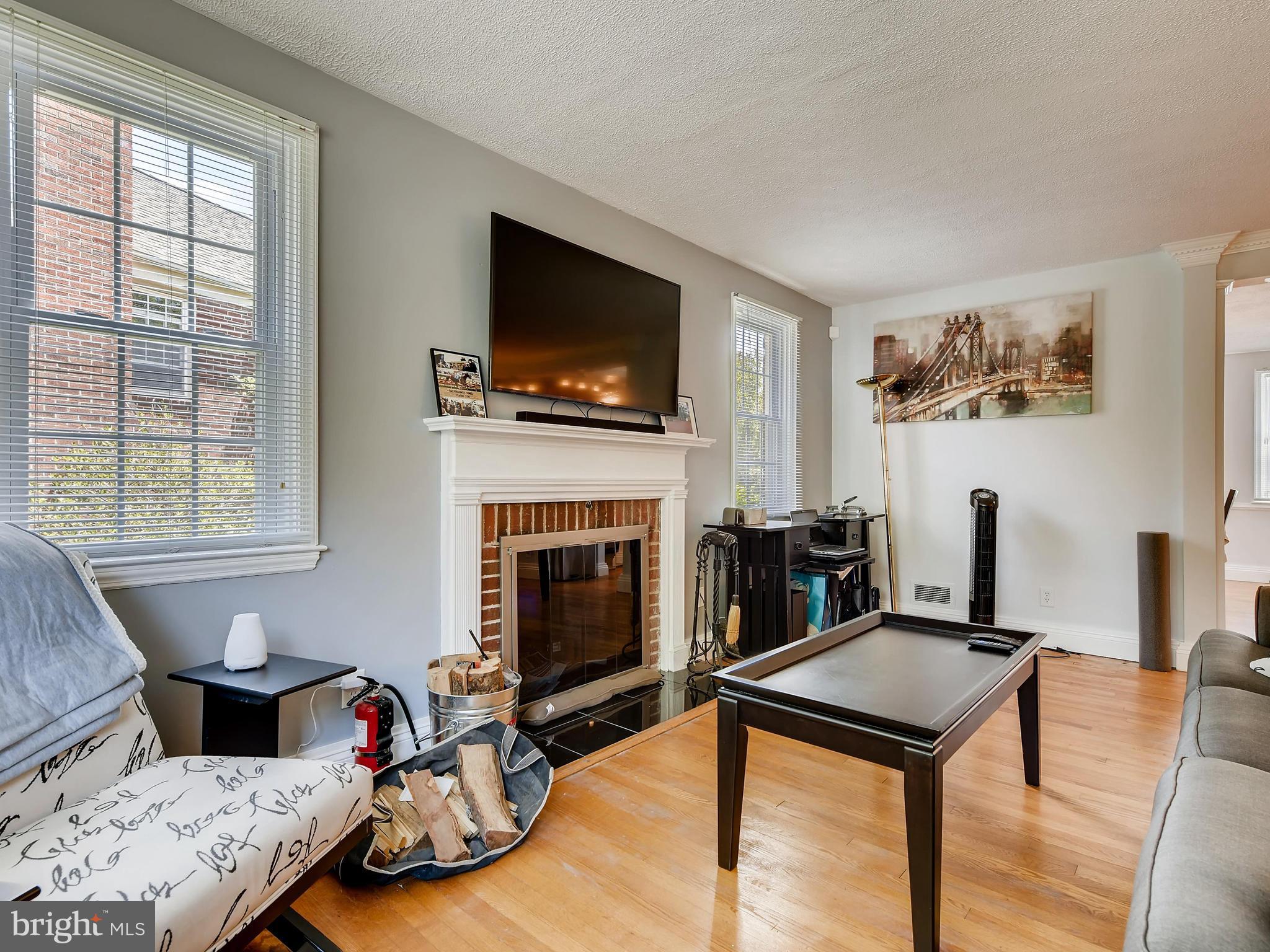1127 Granville Road Baltimore, MD 21207 - Photo 8 of 28 Living room w/ wood burning Fireplace