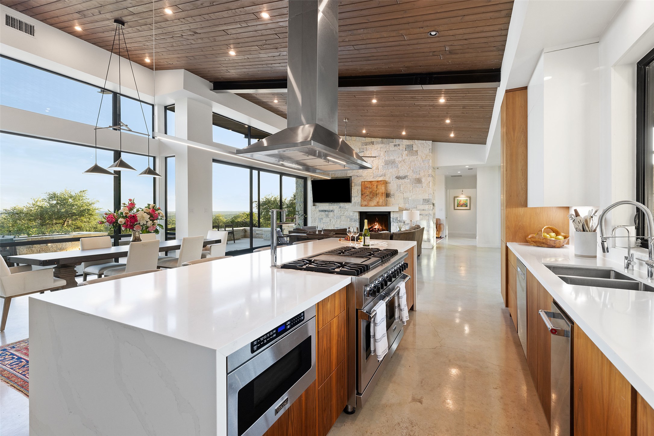 201 Gold Nugget Road Wimberley, TX 78676 - Photo 11 of 40 a kitchen with stainless steel appliances granite countertop a stove and a sink