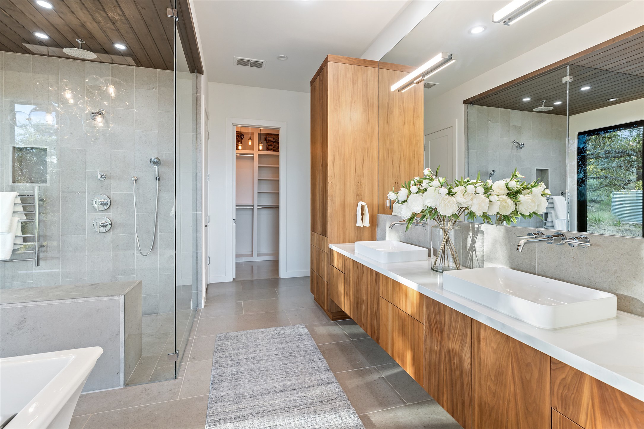 201 Gold Nugget Road Wimberley, TX 78676 - Photo 16 of 40 a bathroom with a sink and a mirror