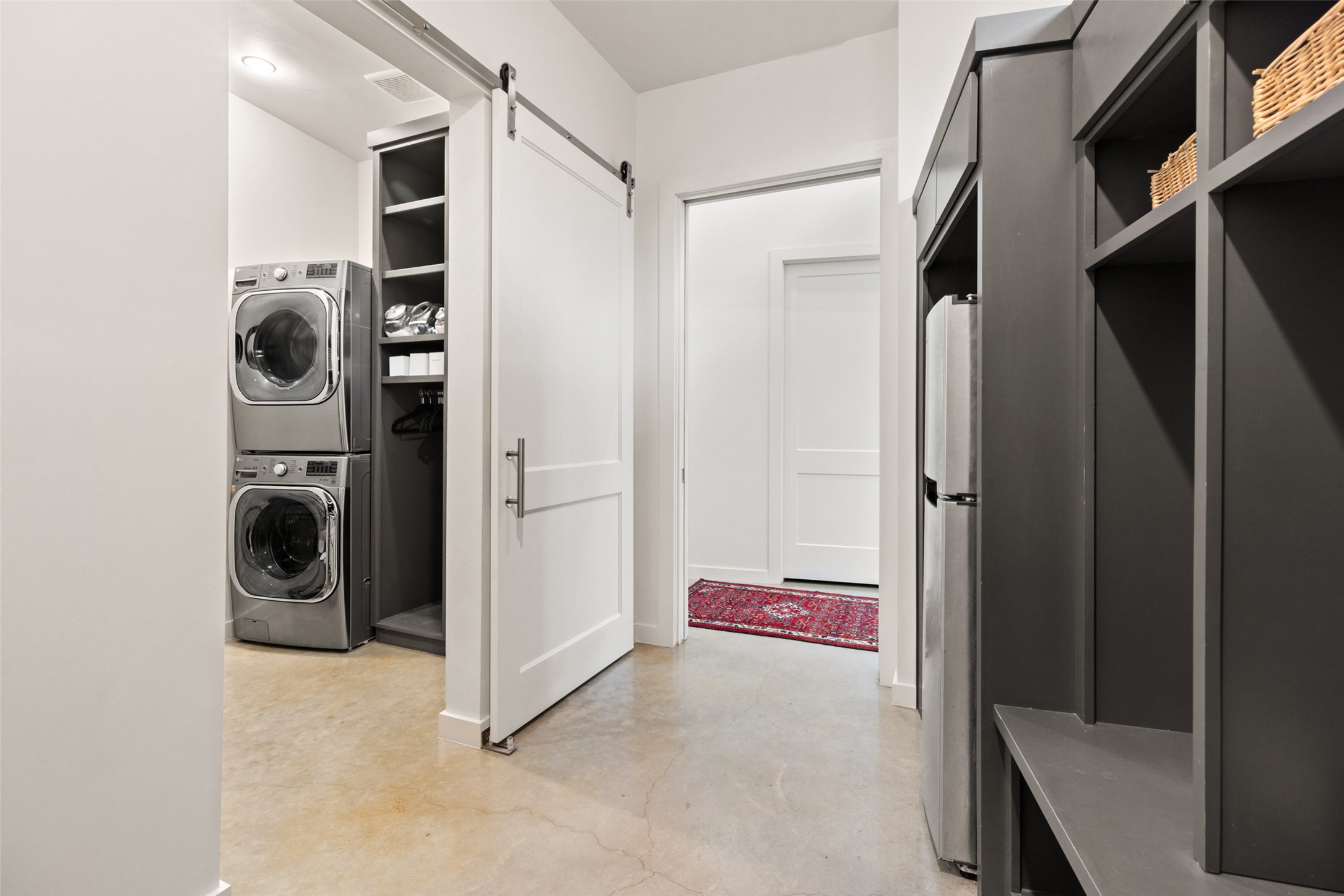 201 Gold Nugget Road Wimberley, TX 78676 - Photo 24 of 40 a view of walk in closet with clothes and shoes
