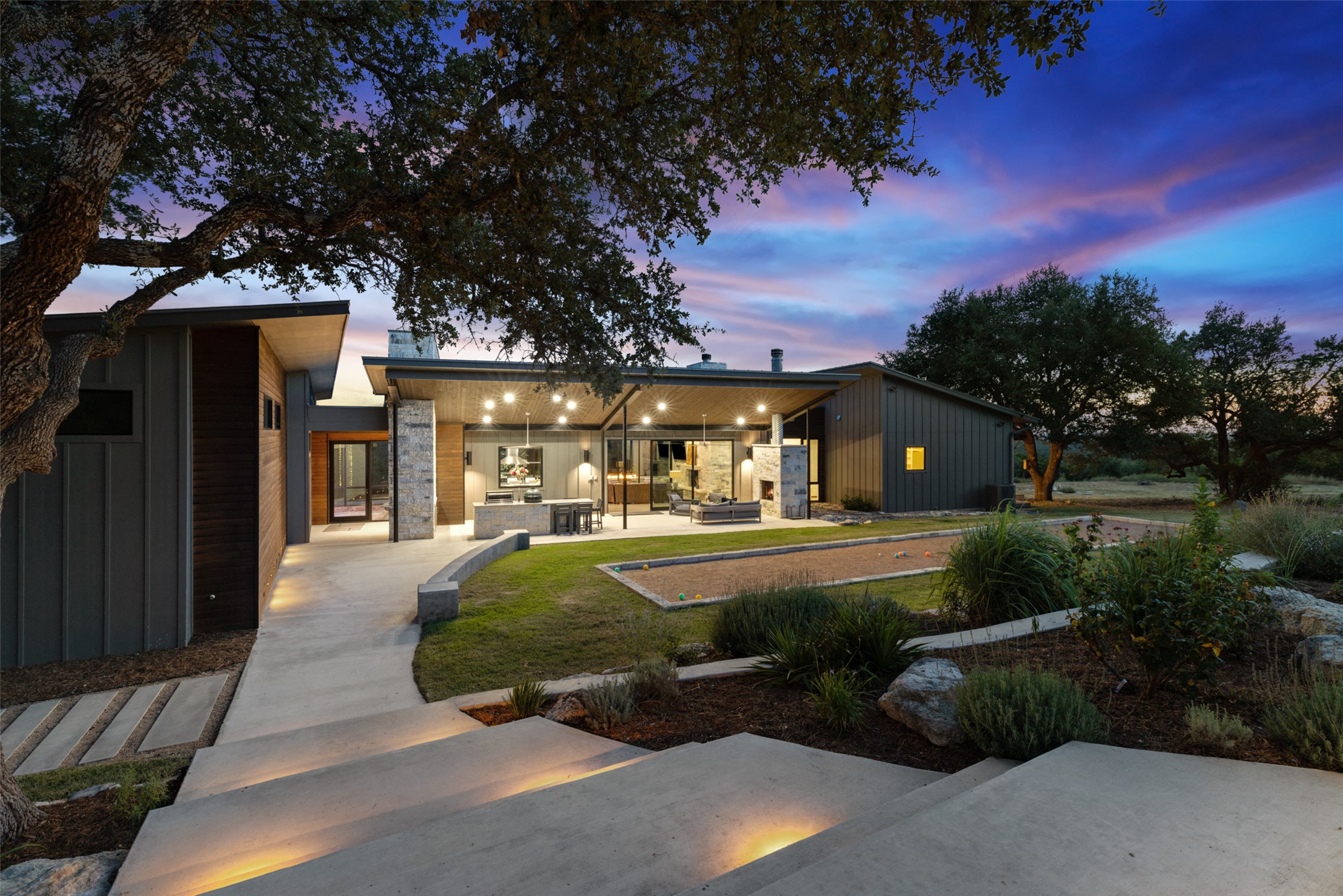 201 Gold Nugget Road Wimberley, TX 78676 - Photo 27 of 40 a swimming pool with outdoor seating and yard