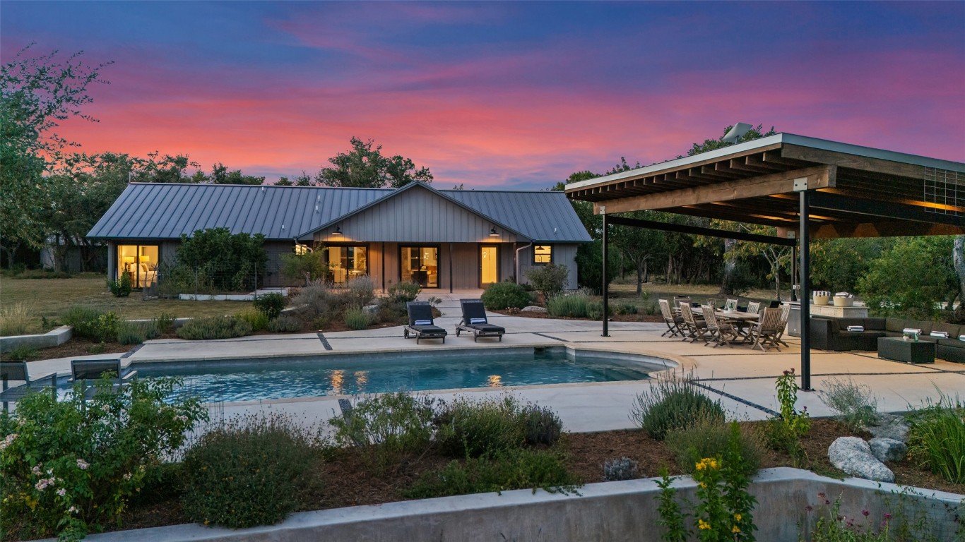 201 Gold Nugget Road Wimberley, TX 78676 - Photo 28 of 40 a view of a house with sitting area and garden