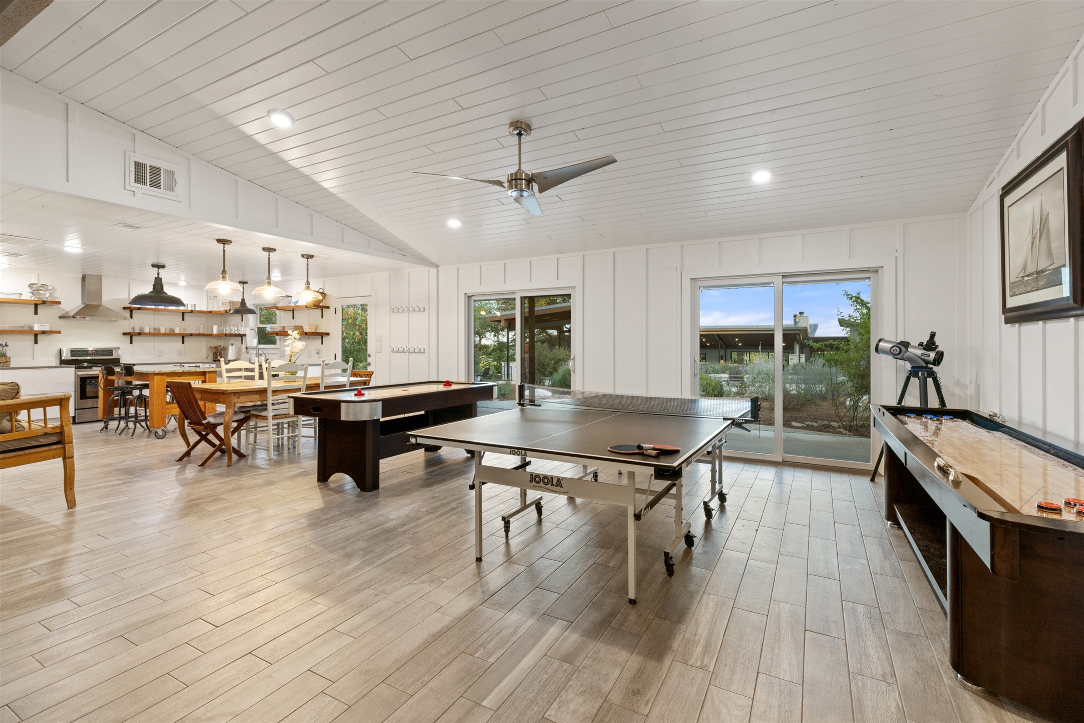 201 Gold Nugget Road Wimberley, TX 78676 - Photo 32 of 40 a living room with stainless steel appliances furniture and a table