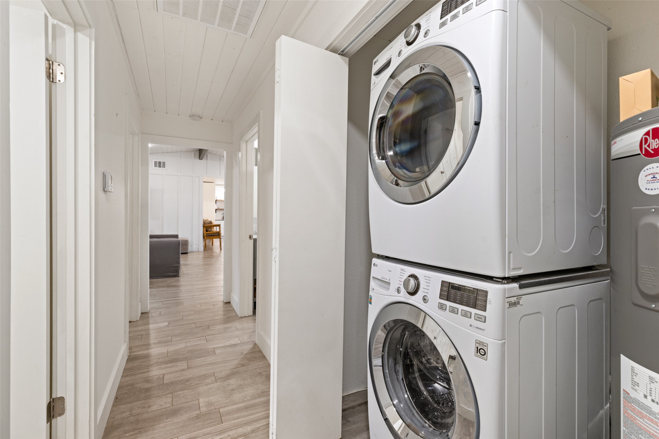 201 Gold Nugget Road Wimberley, TX 78676 - Photo 34 of 40 a view of a hallway with washer and dryer