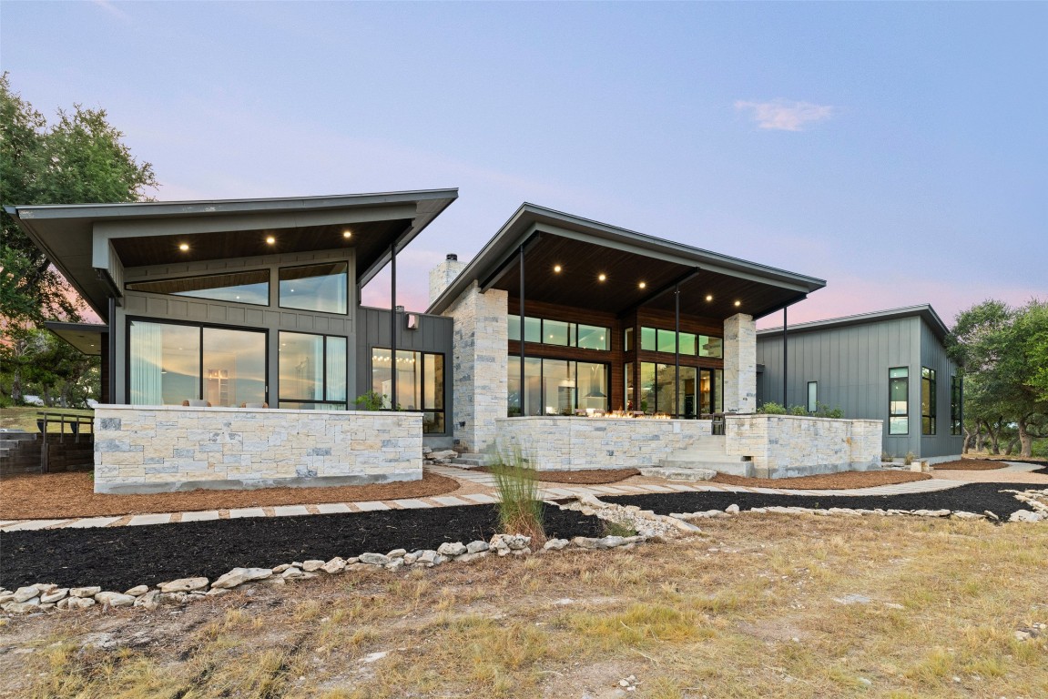 201 Gold Nugget Road Wimberley, TX 78676 - Photo 40 of 40 a view of a house with a yard and sitting area