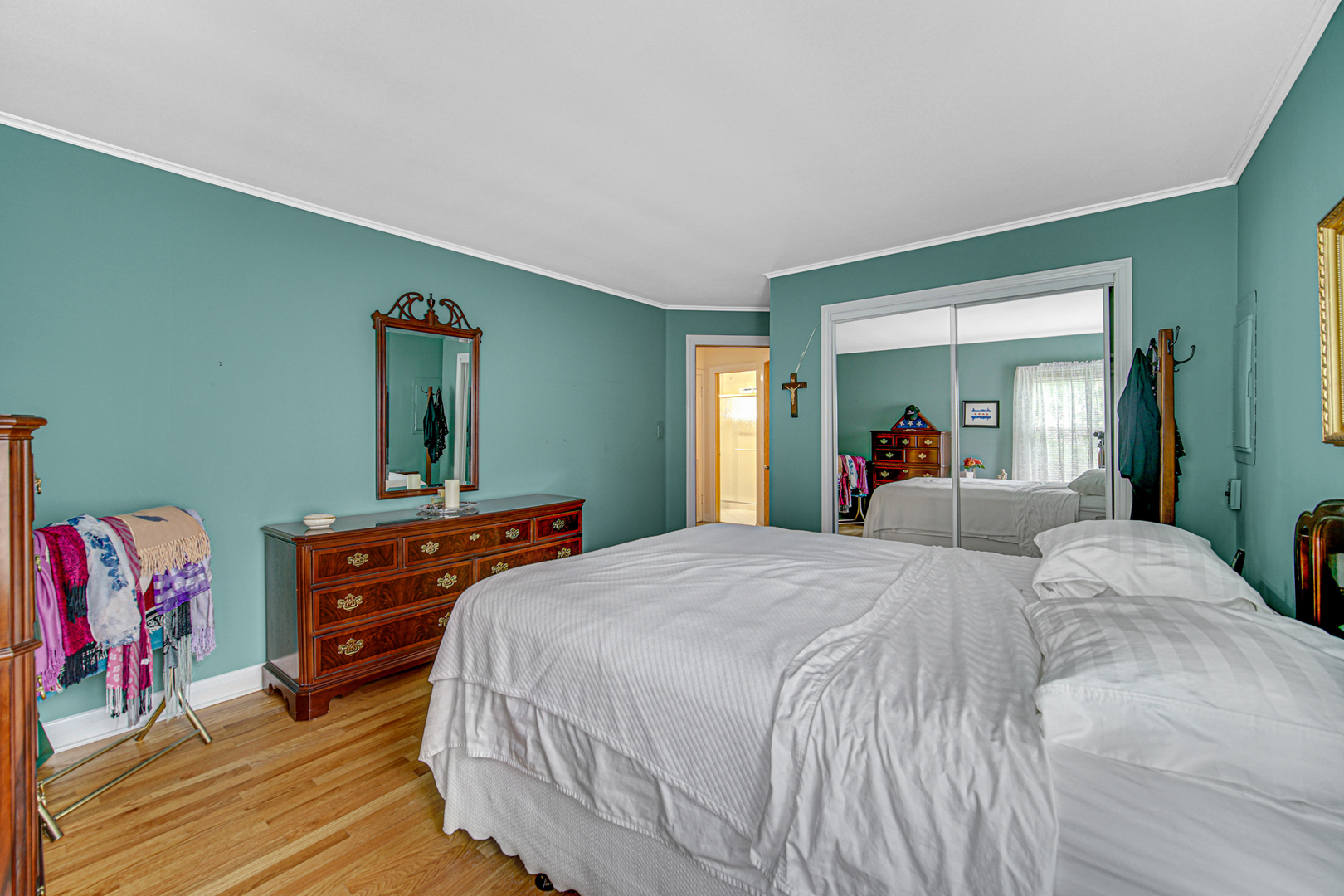 1740 Good Avenue Park Ridge, IL 60068 - Photo 12 of 22 a bedroom with a bed and a dresser in it